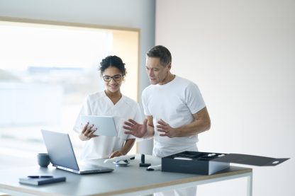 TRIOS-5_Lifestyle-Photo_Two-dentists-unboxing-T5_7952x5304_2022-416x277